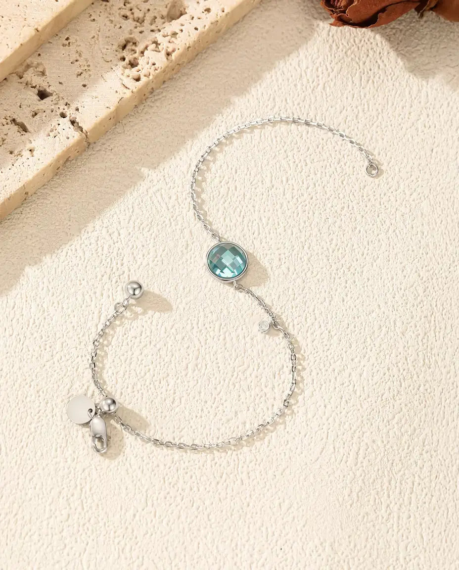 Armband med blå zirkonia - schackrutslipning 8 mm på ankarkedja med glidlås, 925 sterlingsilver