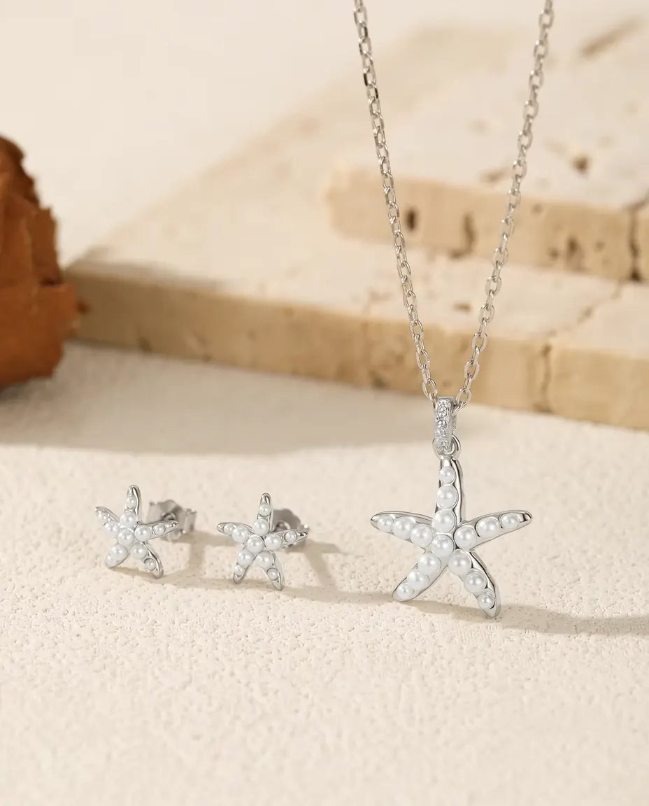 Smyckeset med Sjöstjärna i 925 Sterlingsilver - hela setet på ljus sten