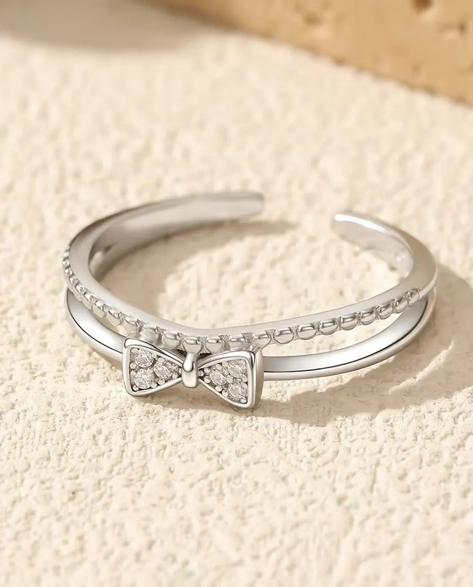 Zirkonia rosett ring - pavéfattad rosett på 3,5 x 7 mm på dubbel skena med pärltråd, justerbar, 925 sterlingsilver, US 6-9