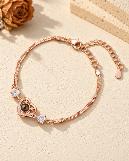 Roséguldfärgat armband med hjorthornshjärta, glittrande sidostenar och dubbel venetianerkedja