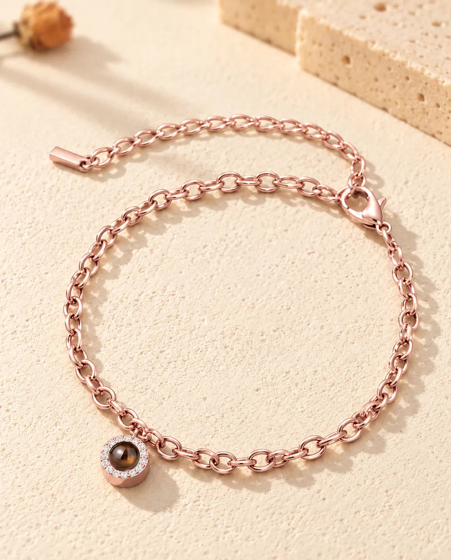 Roséguldfärgat armband med bild inuti, rund zirkoniaberlock, karbinlås och förlängningskedja