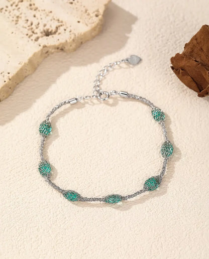 Zirkonia Armband i 925 Sterlingsilver - varianten med gröna zirkonia, närmare silvernätet