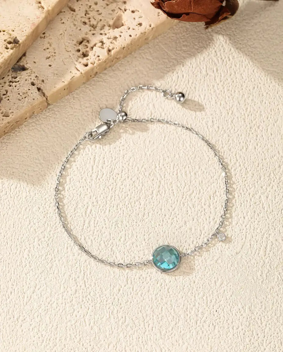 Armband med blå zirkonia - schackrutslipning 8 mm på ankarkedja med glidlås, 925 sterlingsilver