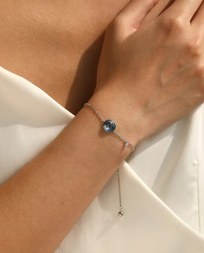 Armband med blå zirkonia - schackrutslipning 8 mm på ankarkedja med glidlås, 925 sterlingsilver
